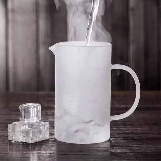 Venda por atacado novo design de ferramentas de vidro com alto teor de borosilicato para uso em cozinha copo de medição de vidro