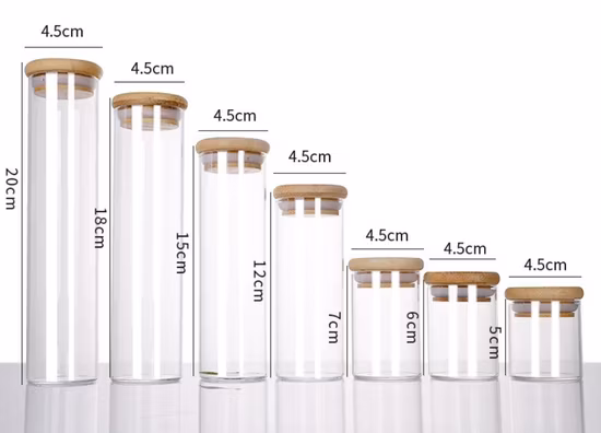 O frasco de vidro com alto teor de borosilicato com tampa redonda de cortiça para armazenamento